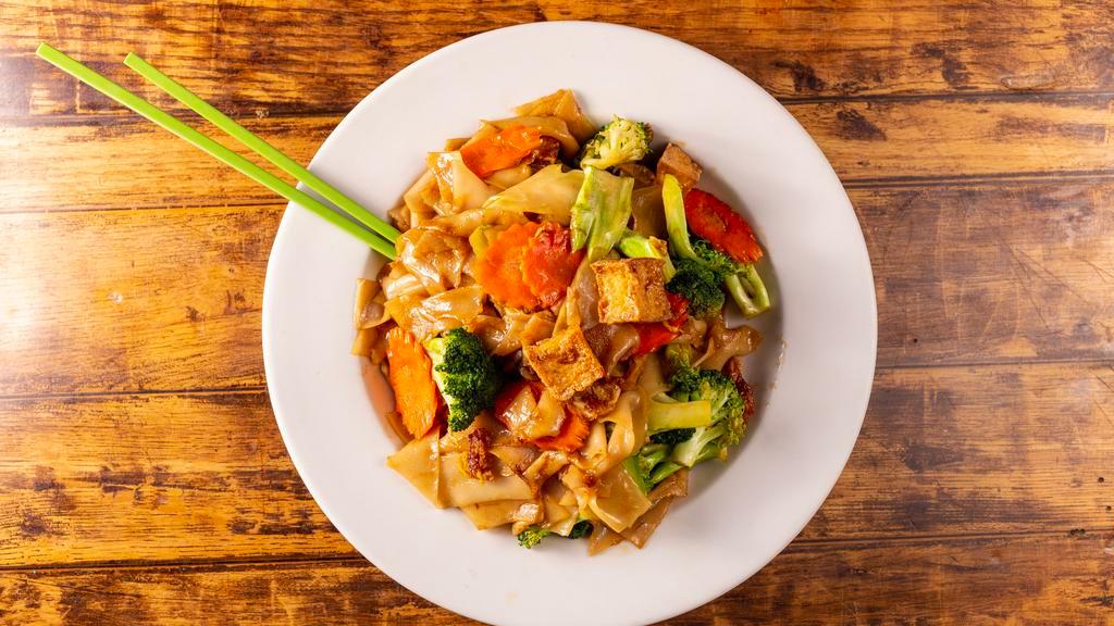Pad See Ew · Stir fried flat rice noodles with your choice of meat, broccoli and egg in sweet black soy sauce.