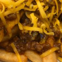 Chili Cheese Fries · Crispy classic fries smothered with all beef chili sprinkled with shredded cheddar cheese.