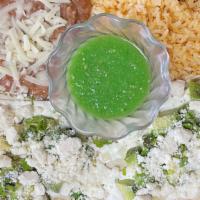 Huaraches (Vegetarian Friendly) · 2 handmade corn tortillas (tortillas hecha mano) topped with sour cream, diced avocado, ques...