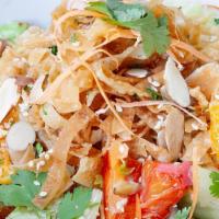 Chinese Chicken Salad · Grilled chicken breast, carrot, bell pepper, red onion, orange, crispy wontons, toasted almo...