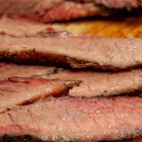 Brisket 1/2 Pound · Cooked over oak, pecan, and cherry. Served with BBQ sauce and pickles.