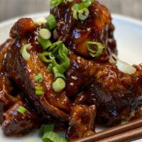 Asian Riblet · Riblets marinated in Asian spiced glazed in house-made asian bbq sauce.