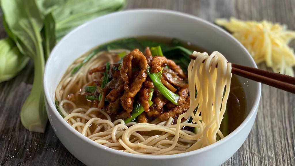 Shredded Pork Noodle Soup · Taiwanese noodles, savory sautéed pork, chinese pickles, bamboo shoots, scallions, bok choy