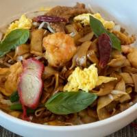 Drunken Noodles · Wide flat noodles, bean sprouts, egg, scallions, thai basil, chili, onions (Spicy)