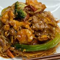 O. Noodles · crispy double-pan fried noodles topped with bean sprouts, cabbage, broccoli, mushrooms, bamb...