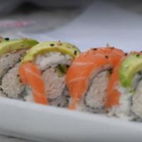Rainbow Roll · Krab and cucumber layered with avocado, salmon, albacore, yellowtail and tuna.