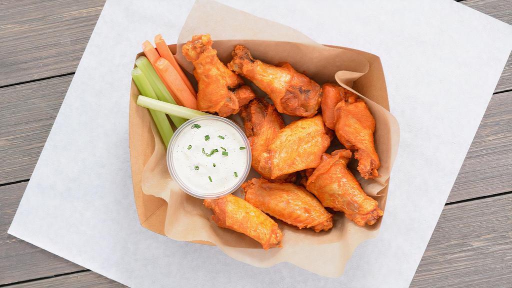 8 Classic Bone-In Wings · 8 Classic bone-in chicken wings tossed in 1 wing flavor and served with fresh carrot & celery sticks and homemade buttermilk ranch or blue cheese dressing