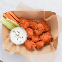 8 Crispy Boneless Wings · 8 crispy, boneless chicken wings fried to perfection. Served with celery and carrots sticks ...