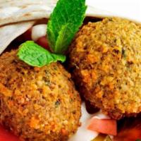 Falafel (6 Pieces) · Vegetarian. Seasoned Ground Garbanzo and Fava Beans Balls, fried to golden brown.