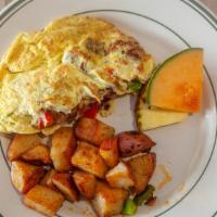 Garden Veggie Lovers  · 3 Farm Fresh Cage-Free eggs served as your choice of a scramble or omelette. Served with red...