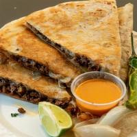 Quesadilla A Mano · Cheese, cilantro, onion, and salsa on a fresh hand made tortilla with your choice of meat.