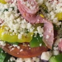 Antipasto Salad · Fresh romaine, tomato, olives, red onion, mushrooms, pepperoni, ham, mozzarella cheese, and ...