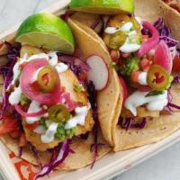 Baja Fish Tacos (2) · Fried or grilled cod, cilantro poblano crema, green cabbage, pico de gallo, corn tortillas