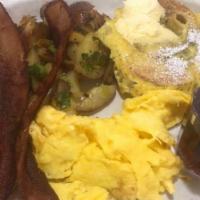 Cinnamon Roll French Toast · Served with bacon or sausage, two fresh eggs, and choice of potatoes