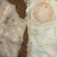 Country Fried Steak · Beef country fried steak, served with three eggs, potatoes, and a choice of toast, biscuit, ...