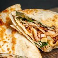 Fajitas Breakfast Burrito · Two scrambled eggs with grilled chicken within and a variety of vegetables, melted cheese, b...