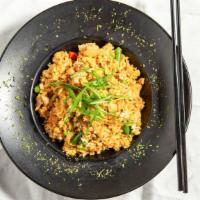 Fried Rice · With peas, carrots, and onion.