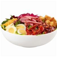 Cobb Salad · Ham, pickled onions, bacon, egg, Cheddar cheese, cornbread croutons with roasted tomato on a...