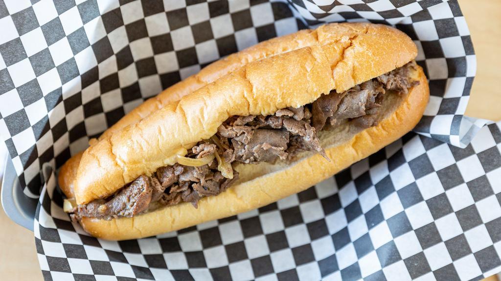 The Cheesesteak · Cheese & grilled onion.