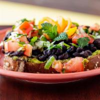 Avocado Toast · Mashed avocado seasoned with salt, lime juice, and olive oil spread over multigrain toast an...