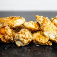  8 Classic Bone-In Wings Combo · 8 classic bone-in chicken wings fried to perfection. Served with a side of ranch or blue che...