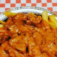 Beef Tikka Masala Fries · Beef Tikka Masala over fresh potato fries.