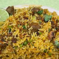 Beef Biryani · Beef fried rice cooked with onions, peas and mild spices.