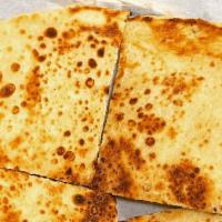 Paratha · Crispy bread layered made with butter.