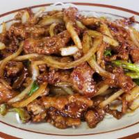 Mongolian Beef · Sliced tender beef toss-fried with spring onion in soy sauce.