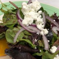 Beet Salad · Served with baby mixed green, red onions, goat cheese and balsamic vinaigrette.