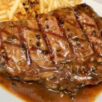 Usda Prime Rib Eye Steak · USDA PRIME   Rib Eye steak Served with Pomme frites and peppercorn  sauce