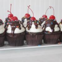 Chocolate Sundae  · Dark chocolate cake, iced with buttercream and topped with chocolate, cherry and sprinkles.