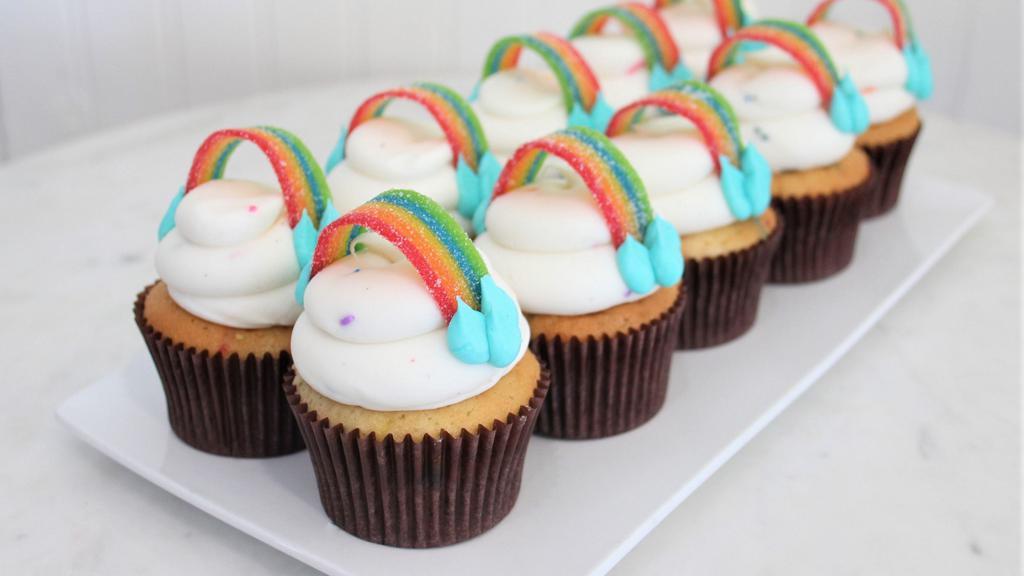 Rainbow Confetti · Vanilla bean cake with rainbow sprinkles. Iced with buttercream topped with rainbow candy stripe.
