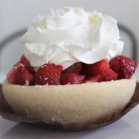 Strawberry Pizza (Seasonal) · Sugar cookie crust filled with a vanilla bean cheesecake and topped with fresh, glazed straw...
