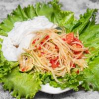 Papaya Salad · Vermicelli noodles and iceberg lettuce included. Pounded in Thai chili, garlic, tomatoes, fi...