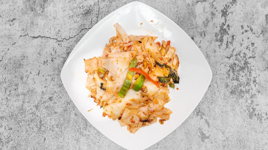 Pad Kee Mao - Drunken Noodles · White onions, green and red bell pepper, green onions, egg, noodles.