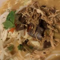 Khao Poon Noodles · Large size only. Vermicelli noodles, chicken broth sautéed in coconut milk, red curry paste,...