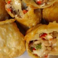 Chicken Queso Rolls · 3 Rolls with Smokey chicken, peppers, onions gooey cheese all rolled up & deep fried served ...
