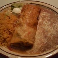 Burrito Al Pastor (Pork) · Our specially seasoned mildly spicy pork stuffed with refried beans, topped with cheese and ...