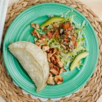 Taco Al Carbon · A soft corn tortilla filled with char-broiled steak or chicken, tomato, cilantro and sliced ...