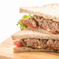 Turkey Melt Sandwich · Turkey melts with a twist. Stacked sandwich
with Swiss cheese, American, sliced deli
turkey ...