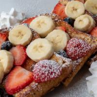 French Toast · 4 tasty french toast topped with powdered sugar.
