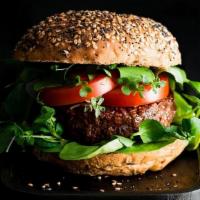Impossible Burger · Greens, tomato , onion , pickle, vegan mayo ,ketchup.