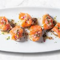 Bruschetta Al Salmone Affumicato · Garlic grilled ciabatta topped with herbed cream cheese, smoked salmon, capers, red