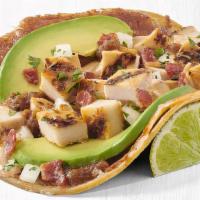 Chicken Taco · Grilled All Natural Chicken served on a corn tortilla with toasted cheese, all natural bacon...