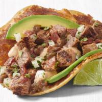 Steak Taco · Grilled USDA-Choice Steak served on a corn tortilla with toasted cheese, crisp all natural b...