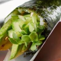 Vegan Sushi Hand Roll · Avocado, cucumber, kaiware, and sesame seeds with sushi rice and Japanese seaweed.