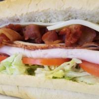 Club Sandwich · Turkey, bacon, mayo, lettuce, tomato and cheese.