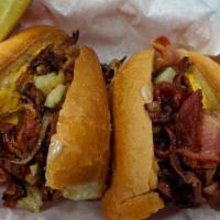 Pastrami Sandwich · Pastrami, onions, pickles, mustard and cheese.