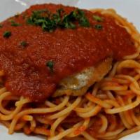 Chicken Parmesan · Served with spaghetti marinara.